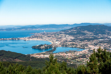 Fototapeta premium Beautiful view of the mouth of the Miñor River and Baiona Bay from the Cortelliño viewpoint in A Groba. Rias Baixas, Galicia, Spain.