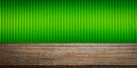 The background is blank wooden boards and a textured striped wall with gradient lighting and vignetting.
