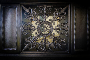 Swedish black metal oven decoration