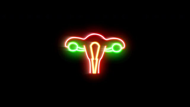 The blinking neon light of an organ system icon, against a black background.