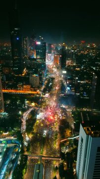 New Year, firework in city 4K footage drone potrait | Jakarta 