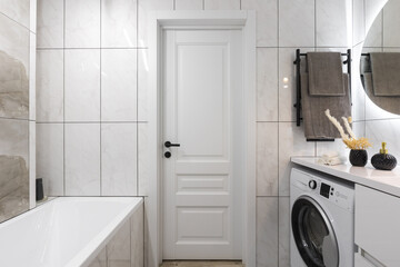modern bathroom room with toilet and washing machine