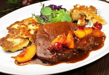 Roasted Deer with Potato - caramelized Cranberries  and Apricots