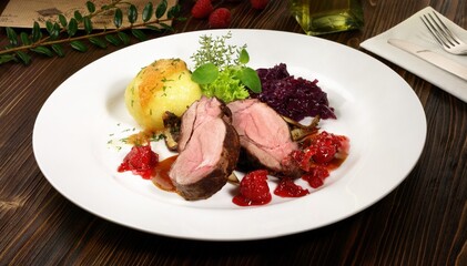 Wild Boar Steak with red Cabbage and Potato Dumpling