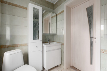 modern bathroom room with toilet and washing machine