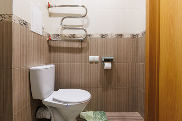 modern bathroom room with toilet and washing machine