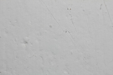 Old white mortar wall background. Stone plastered stucco wall. Color gray grunge cement backgrounds. Raw concrete texture. top view. White background rough paper texture