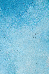 Blue grunge textured concrete surface. Top view. Free space for text or design.