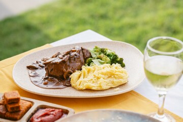 Steak with Mushroom Gravy, Mashed Potatoes, and Broccoli