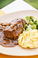 Steak with Mushroom Gravy, Mashed Potatoes, and Broccoli