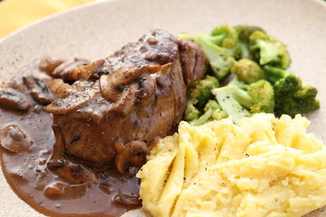 Steak with Mushroom Gravy, Mashed Potatoes, and Broccoli