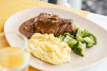 Steak with Mushroom Gravy, Mashed Potatoes, and Broccoli