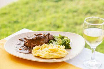 Steak with Mushroom Gravy, Mashed Potatoes, and Broccoli