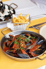 Mussels in Tomato Sauce with Fries