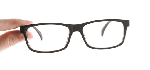Woman holding glasses with black plastic frame on white background, closeup