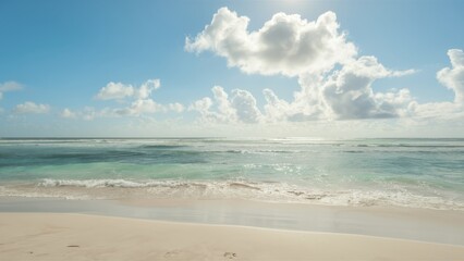 Fototapeta premium Serene tropical beach, turquoise ocean waves, soft sandy shore, fluffy white clouds, clear blue sky, peaceful coastline, gentle surf, tranquil seascape, sun-drenched landscape, idyllic vacation scene,