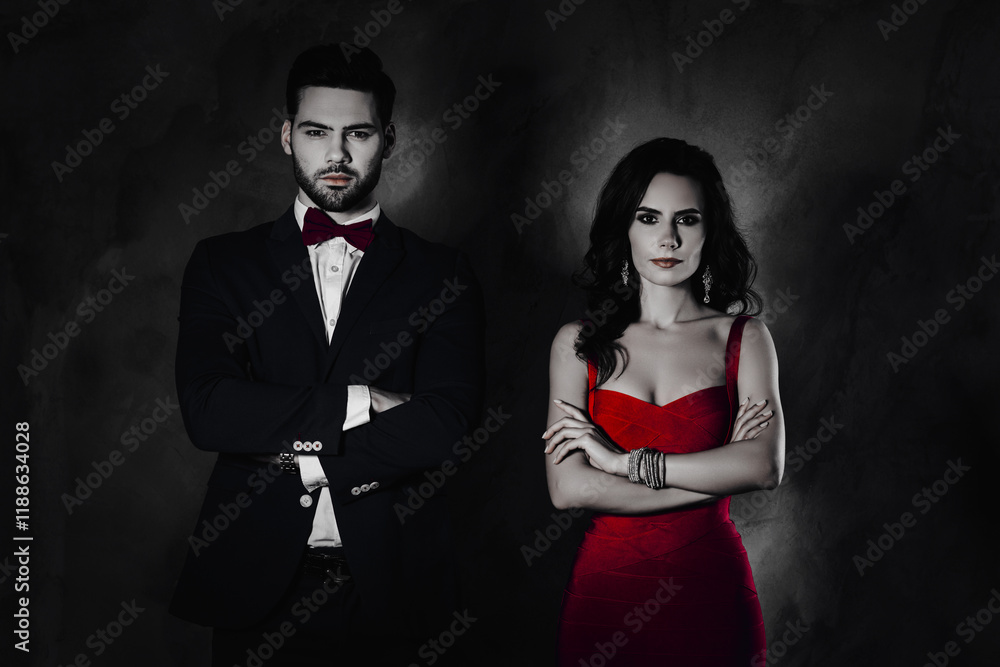 Poster portrait of brutal mr with stubble in tuxedo with bowtie and charming pretty woman in dress with bij