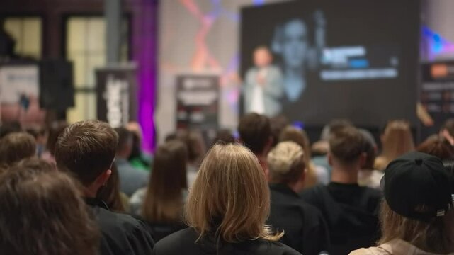 Creative individuals attend workshop on self-improvement, focusing on artistic skill enhancement. Youth explore self-development techniques in creative fields, participating actively in seminar.