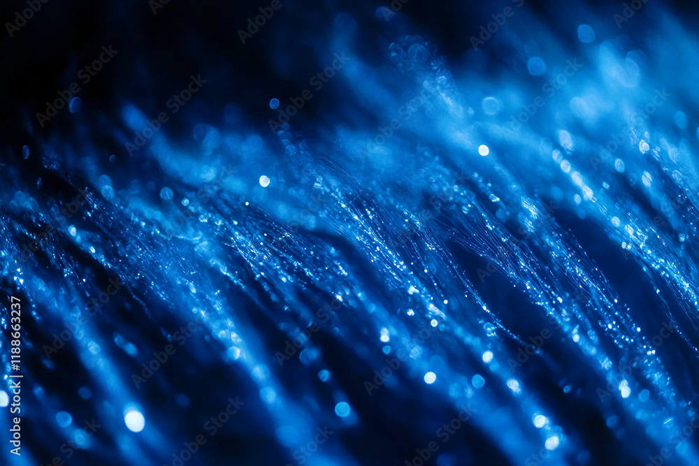 Poster Abstract blue glowing lights with bokeh effect in a dark background