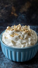 A Delectable Whipped Cream Dessert with Exquisite Almond Garnish. A Culinary Masterpiece of Creamy Delight