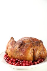 Delicious baked turkey and cranberries on white table, space for text