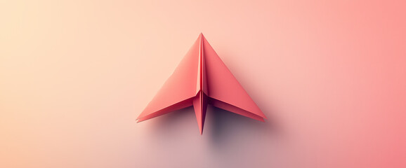 Photo of a paper airplane on a light background, top view. Minimalist style.