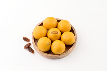 Besan ladoo, a traditional Indian sweet made from gram flour, ghee, sugar, and cardamom.