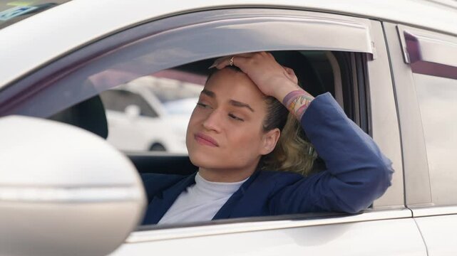 Anxiety and stress. Transwoman driver behind the wheel of the car is upset. Crisis and depression 

