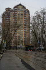 A gray winter day in Moscow. Tram stop at the house on Krasnostudenchesky passage.