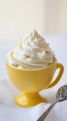 Whipped Cream in a Vibrant Yellow Cup: A Delightful Dessert Topping
