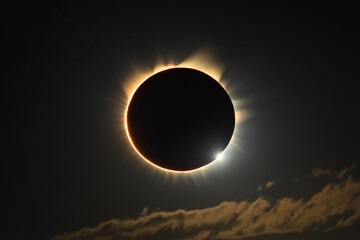 Obraz premium Unique view of solar eclipse revealing the sun's corona with striking effects during a natural phenomenon over Earth