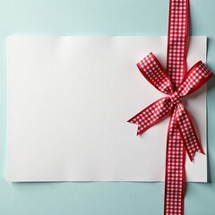 Red and white checkered ribbon tied in a bow on a blank card , image, blank