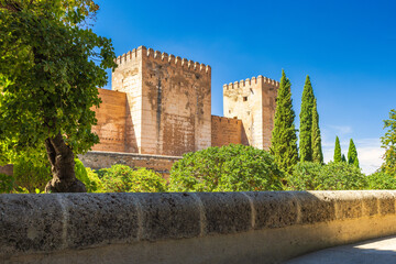 The Alcazaba fortress at the Alhambra complex in Granada town, Andalusia, Spain. Ancient stone...