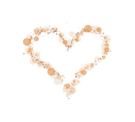 Orange star trail in the shape of a heart. Shimmering dust flying and leaving behind a heart-shaped trail. Bright dust particles glow with the special festive light of Christmas. PNG.