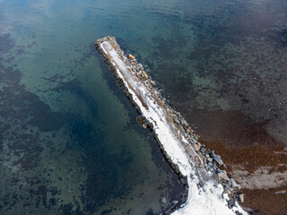 Natural pier and Norwegian Sea from above, aerial shot at 90° angle