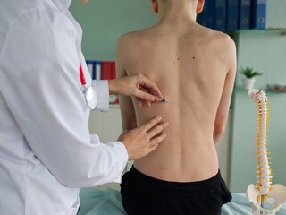 Medical advisor holding syringe in his hands and giving an injection to patient concept