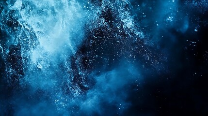 Fototapeta premium Abstract Blue Powder Explosion Against Dark Background
