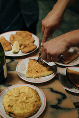 Traditional Argentinian catholic food. Closeup view of puff pastry tuna fish pie slice