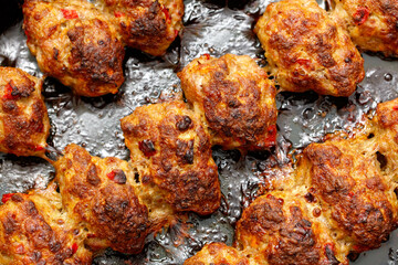 A pan of meat is cooking in a pan