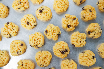 photo image of delicious raisin cookies. Cookies before baking on a tray
