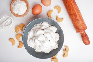 kue putri salju or princess snow cookies or snow white cookies isolated on white. popular indonesian cookies for lebaran. selected focus