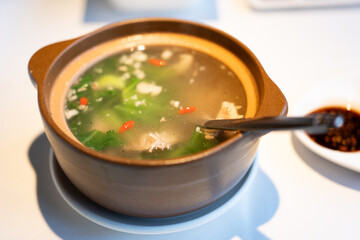 Duck meat and wolfberry vegetable soup at a Cantonese Chinese restaurant in Asia China