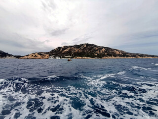 Navigating through the Italian Strait of Bonifacio in front of the Spargi Island. A strait that...