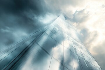 Modern Glass Skyscraper Reaching Towards Cloudy Sky