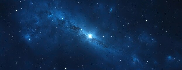 A spiral galaxy, centered in the frame, against a black background, with stars and nebulae in blue hues.