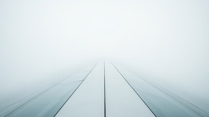 Foggy skyscraper rooftop with vanishing point perspective.