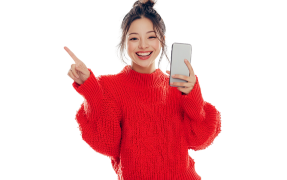 Happy woman in a red sweater holding a smartphone horizontally, pointing at it cheerfully with a bright expression, set against a clean white background.

 - Powered by Adobe