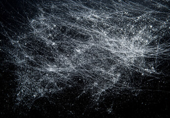 Obraz premium White Dust and Scratches on Dark Background