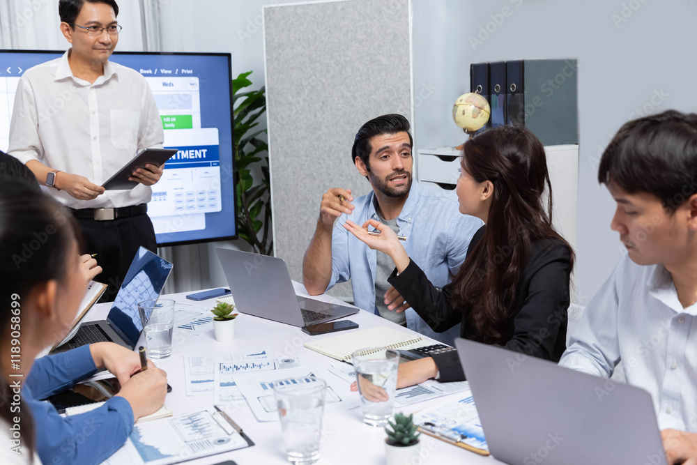 Leinwandbilder Project manager communicate and collaborate with team using project management software display on monitor, tracking progress of project task and making schedule plan at meeting table. Prudent