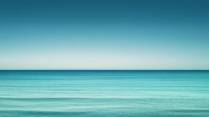 Fototapeta premium Tranquil Oceanic Gradient - Minimalist Abstract Backdrop in Serene Blue and Deep Green Tones